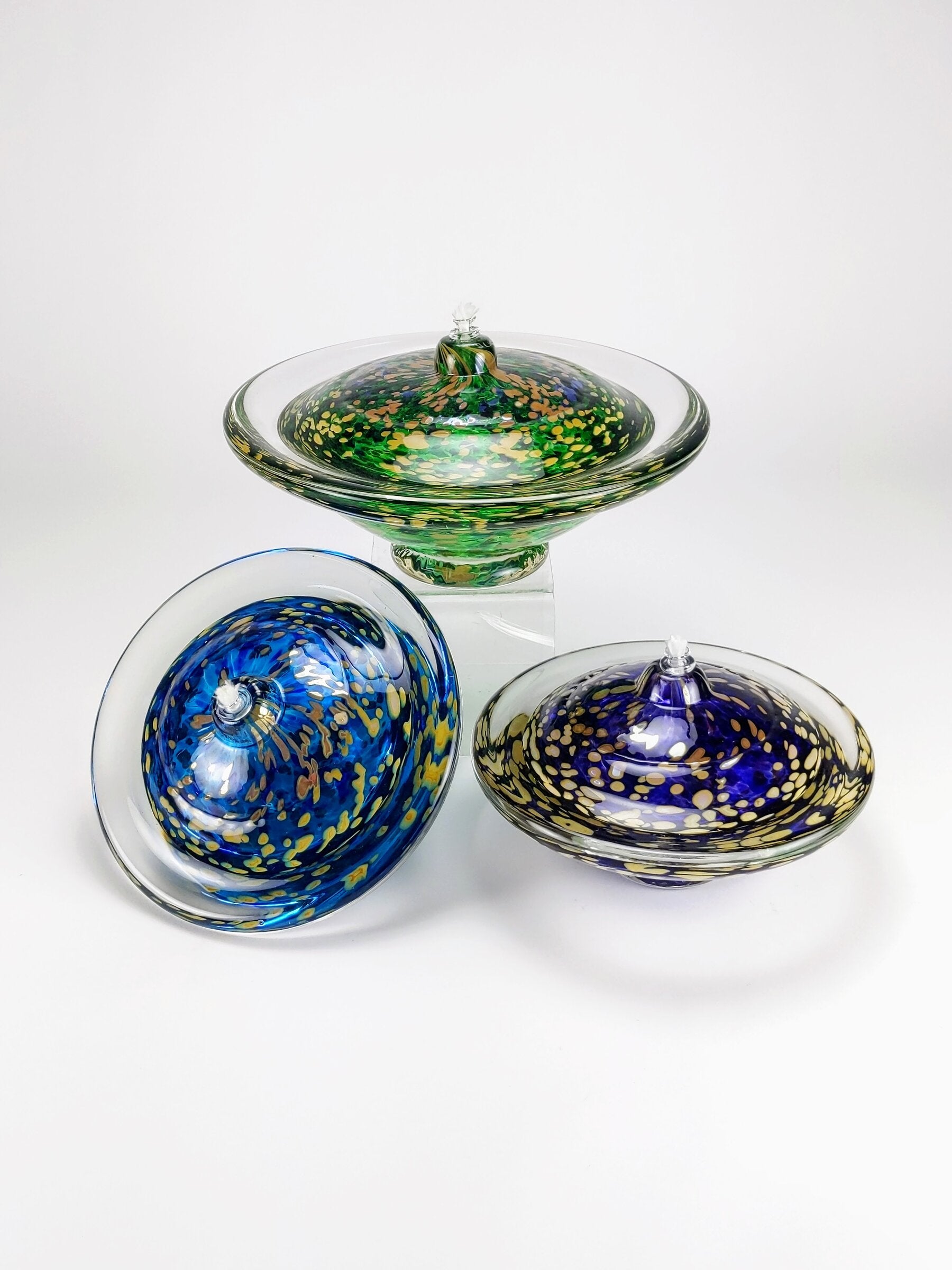 from top, clockwise: emerald, amethyst, sapphire