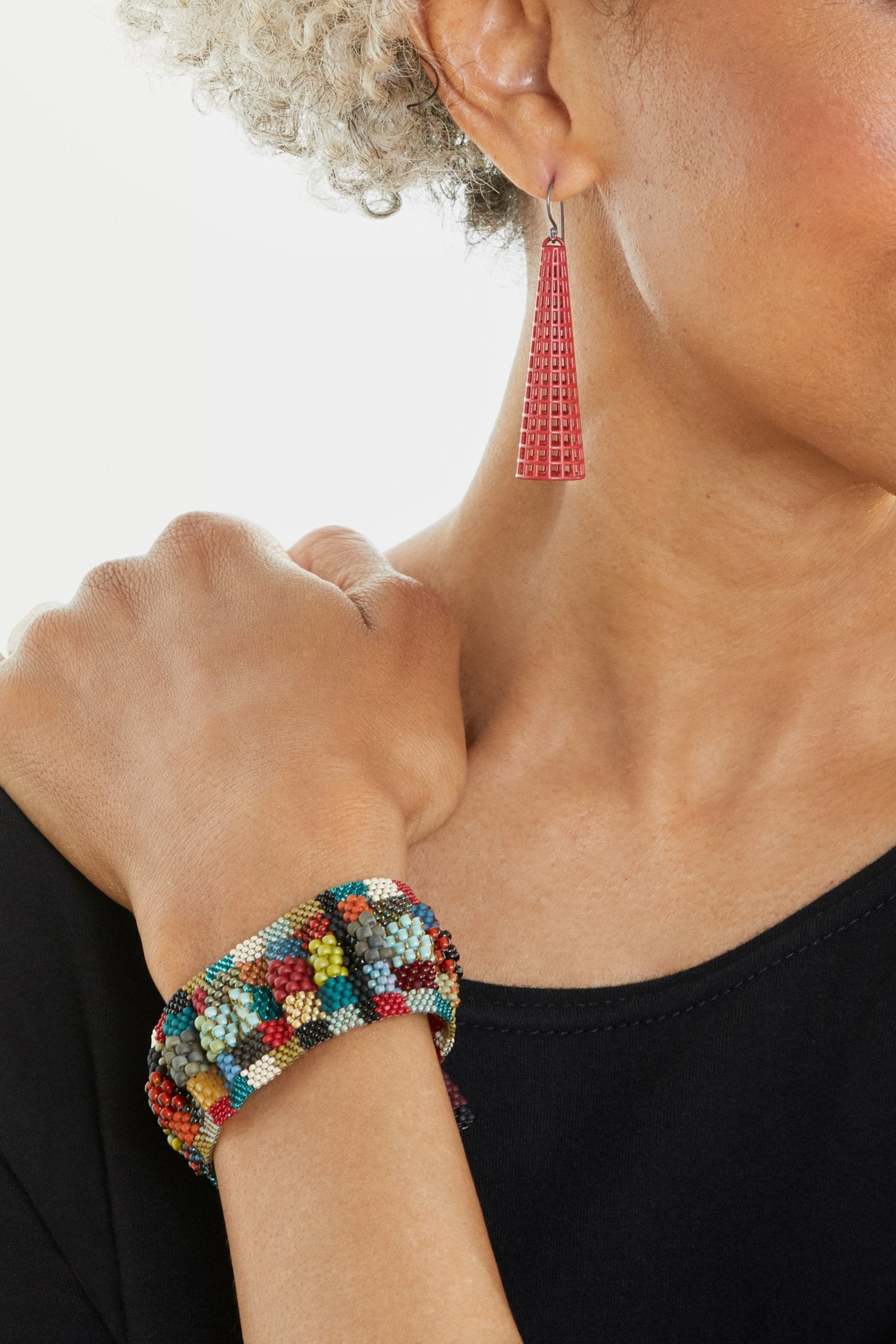 coral, shown with the Vintage Palette Ripple Check Cuff Bracelet by Julie Powell