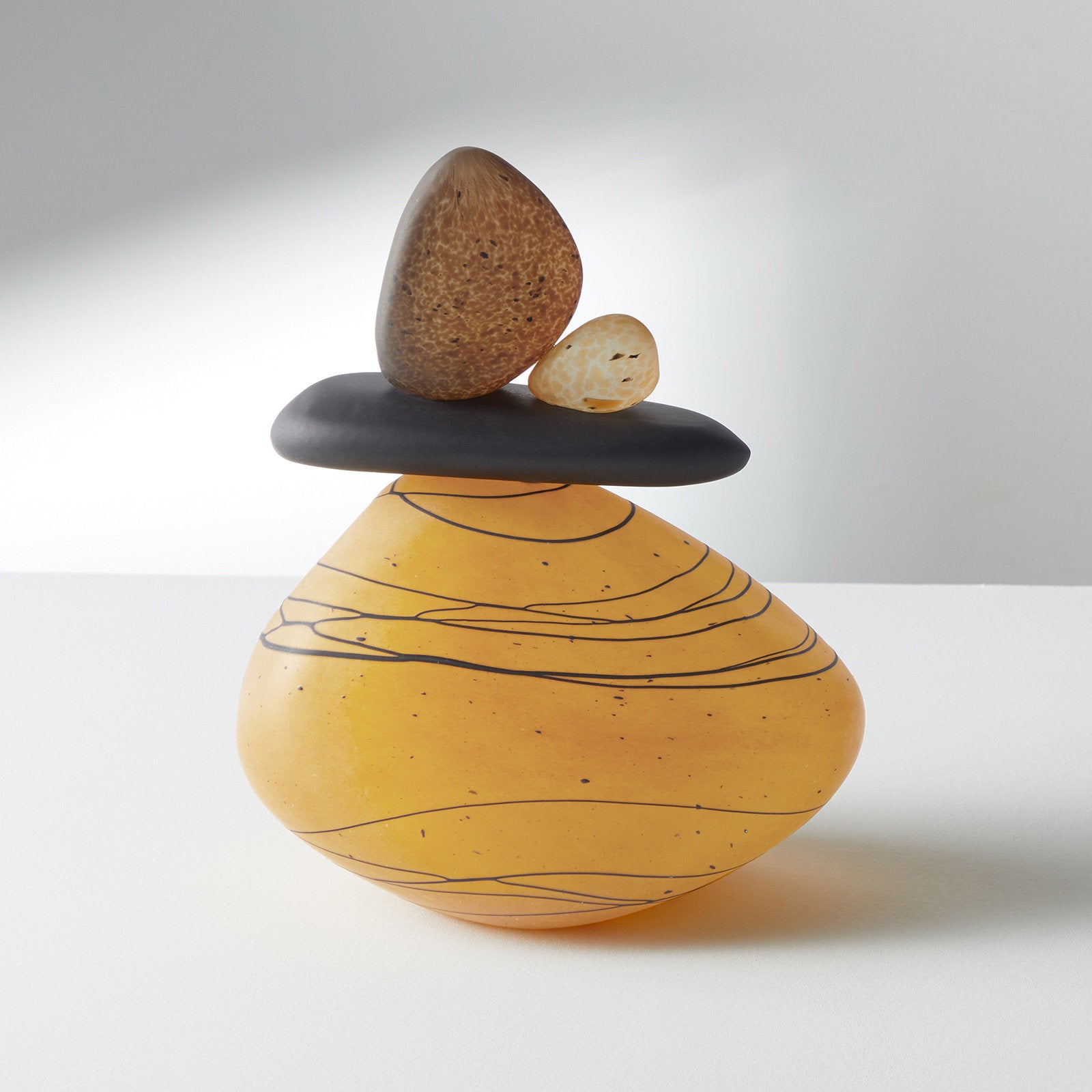 small cairn in gold