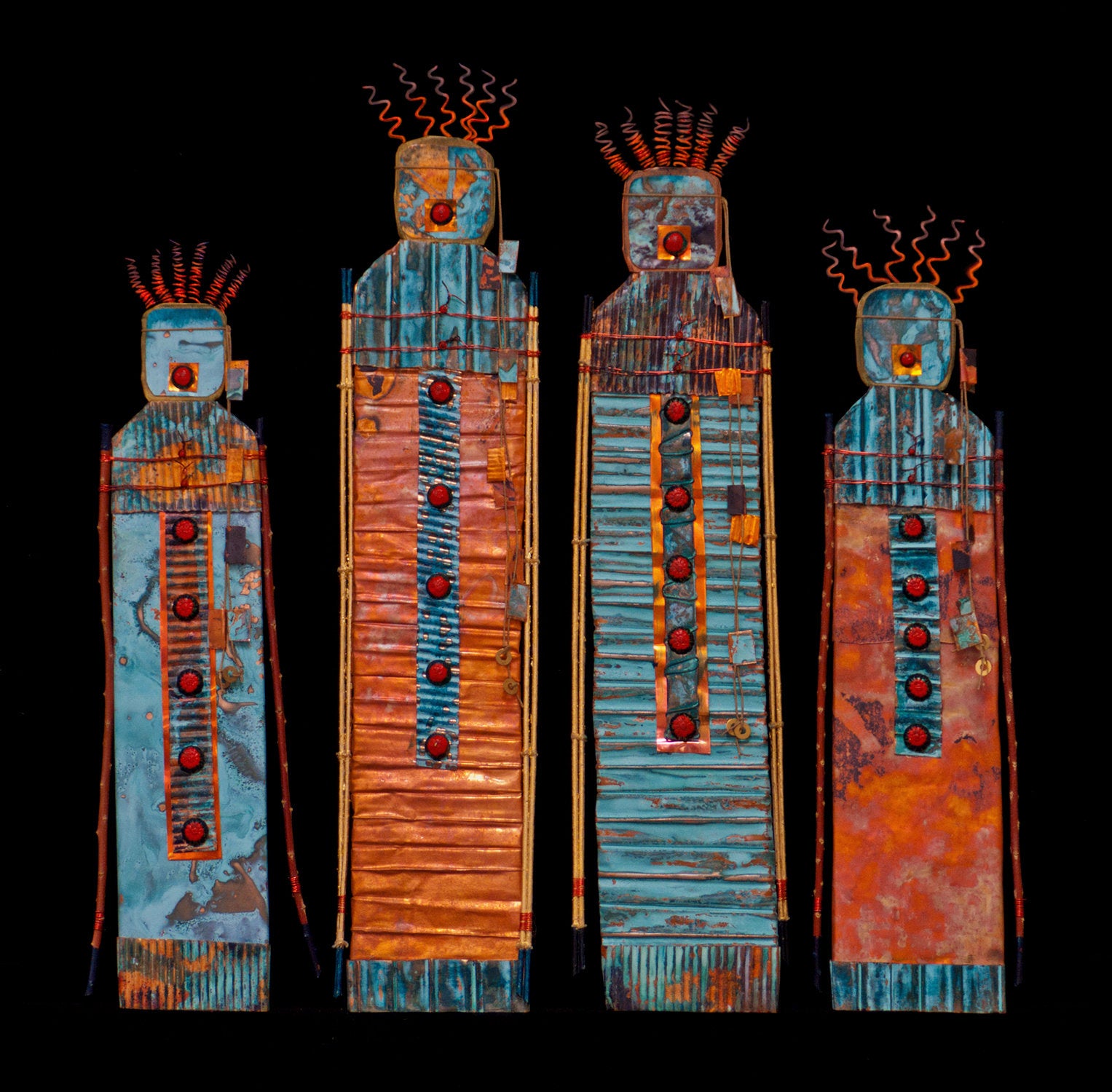 left to right: small fire keeper blue, medium fire keeper orange, medium fire keeper blue, small fire keeper orange