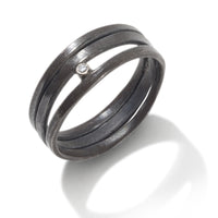 oxidized silver with white diamond | Photo by Pencil One