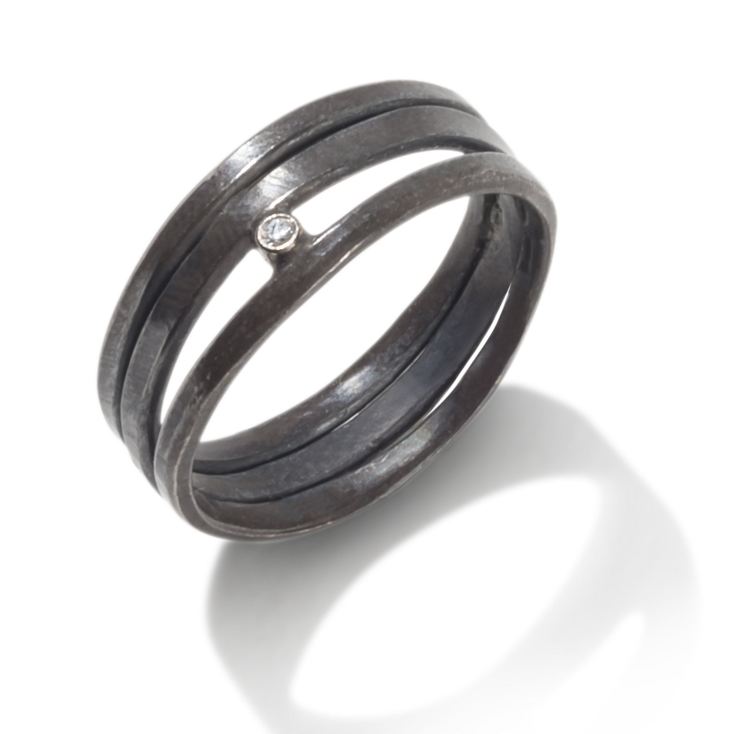oxidized silver with white diamond | Photo by Pencil One