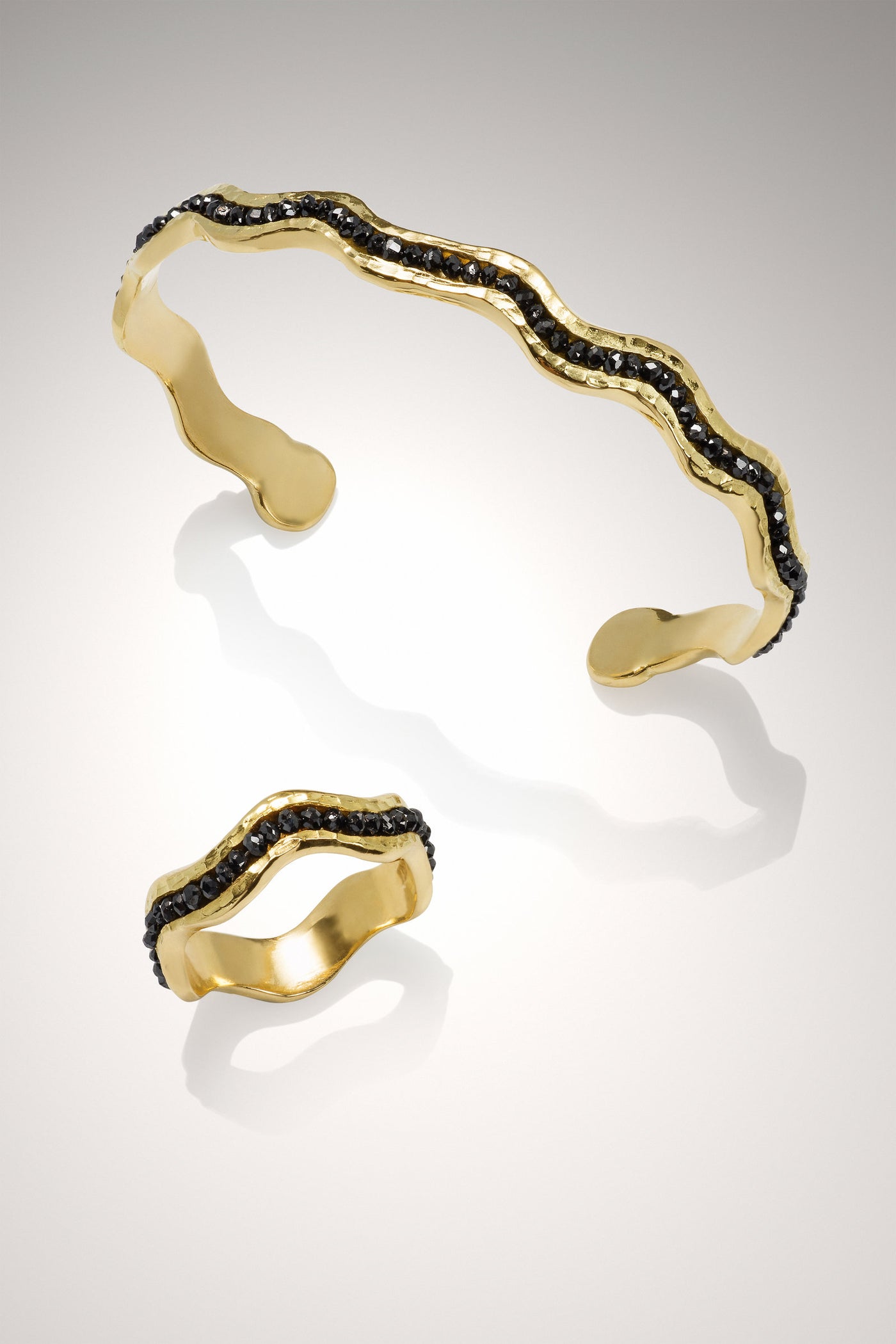 black diamond, shown with the coordinating wave ring