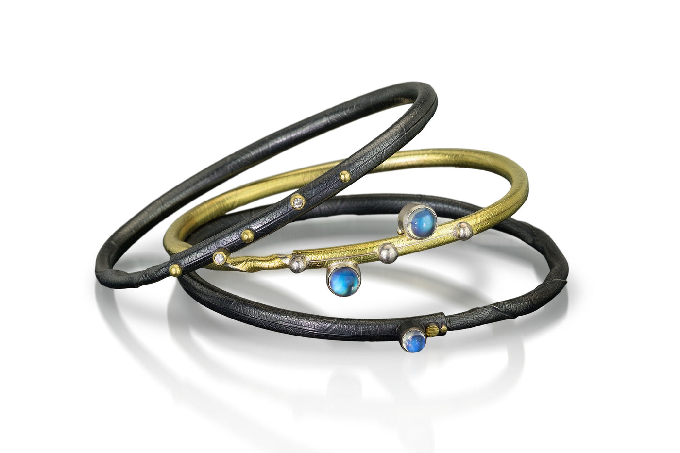 Top to bottom: Oxidized Diamond, Gold Double Moonstone, Oxidized Single Moonstone | Photo by Cole Rodger Photographics