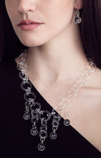 shown with the ball drop earrings