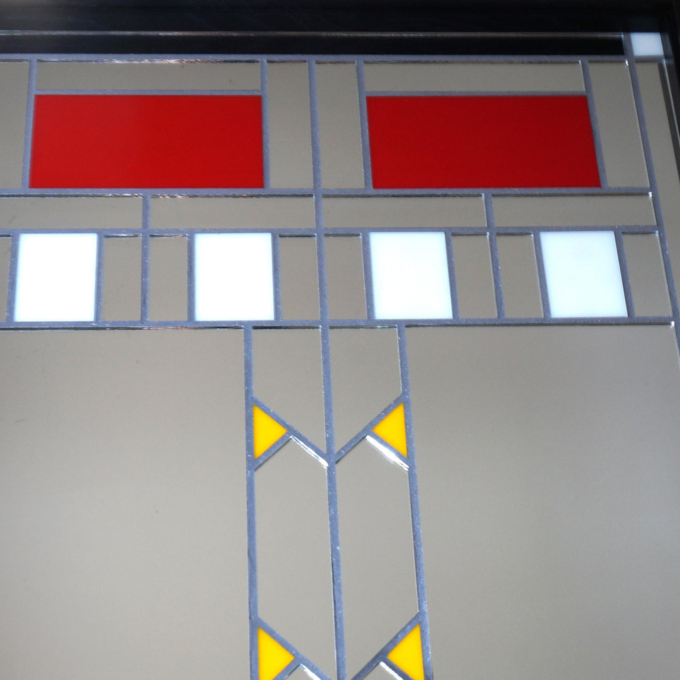 Closeup of Craftsman-style "Cornelius 18x36" mosaic mirror with stained glass