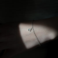 Horse Charm in bright silver on Model, chain not included with charm