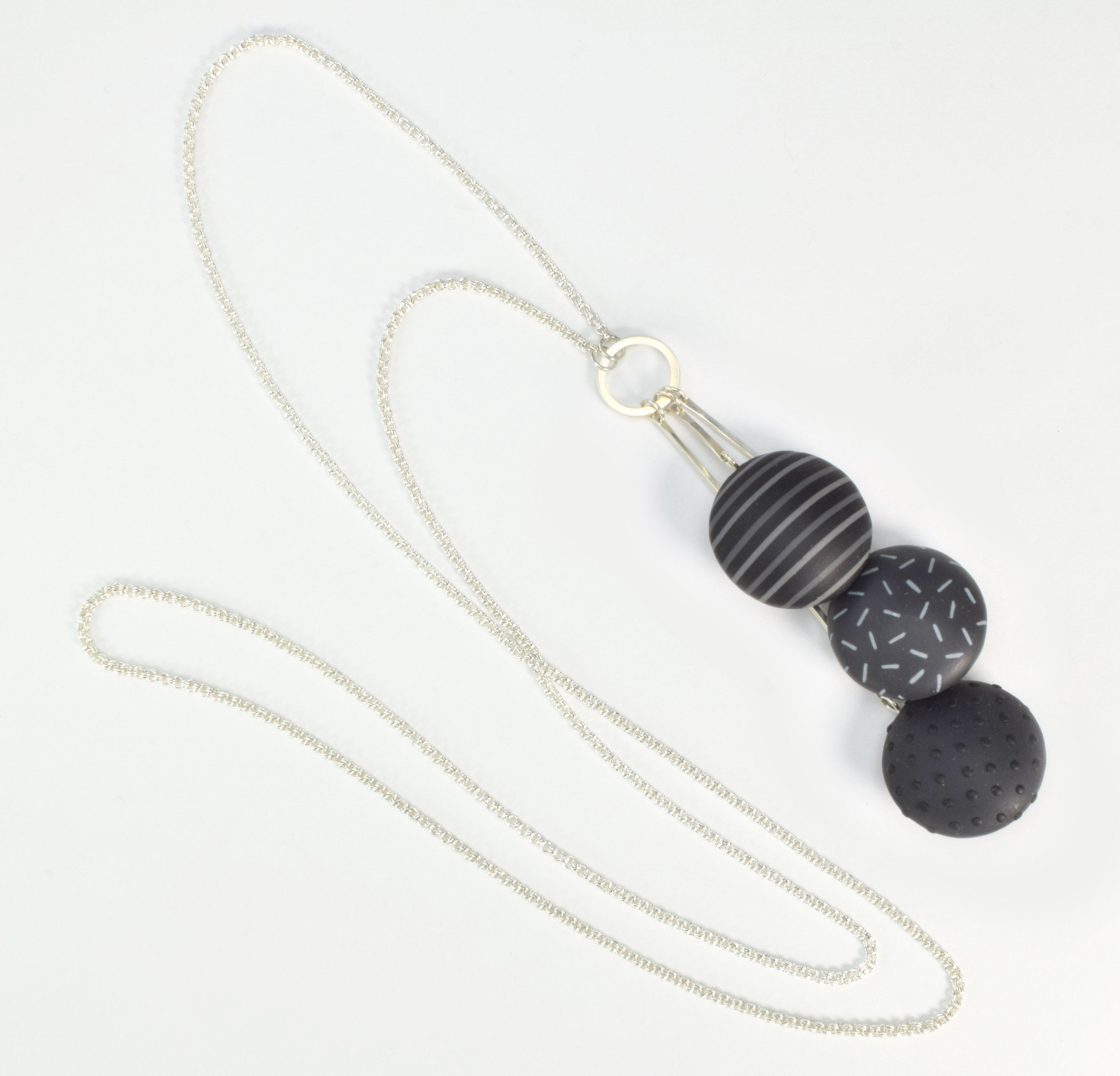 Triple lentil pendant with complete chain