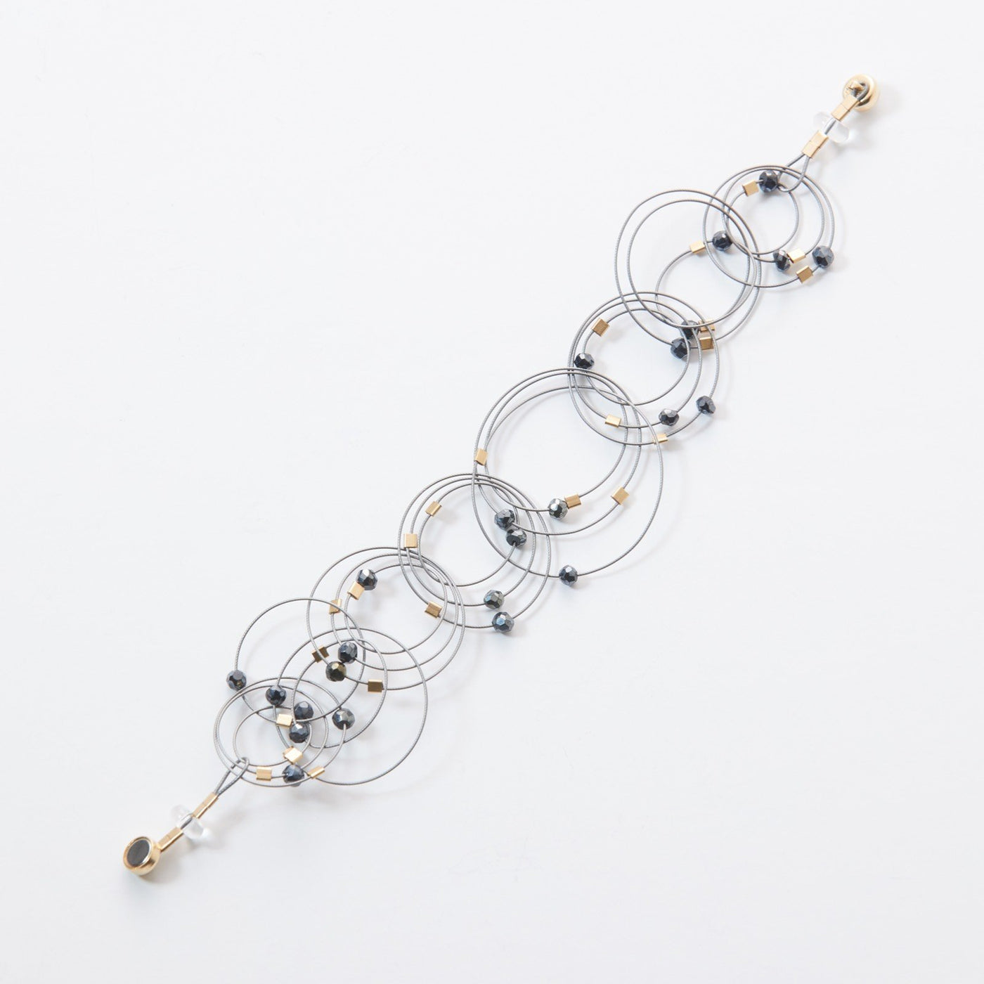 Spinel on Steel Cable with Gold Hardware