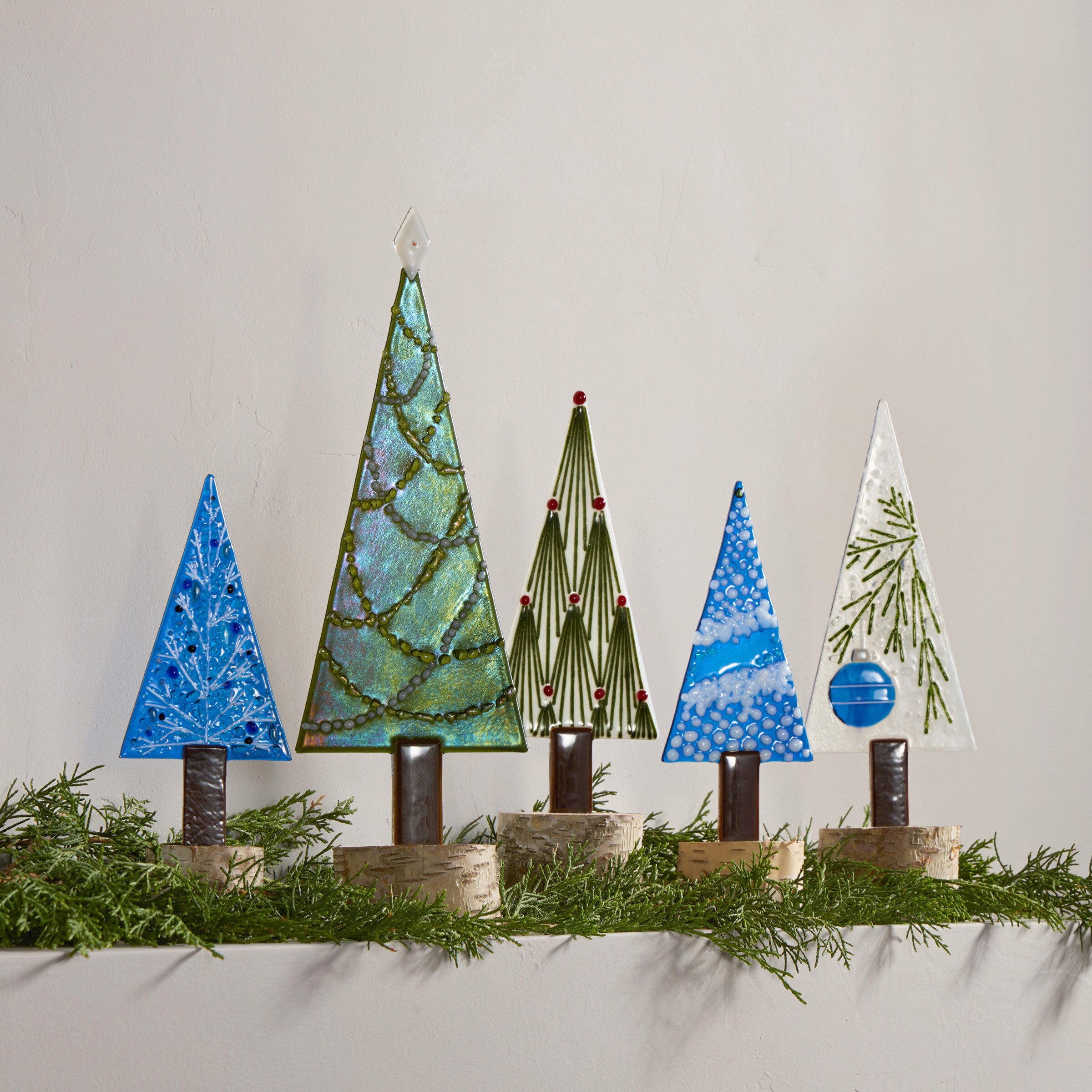 left to right in the group image: Moonglow, Sea Sparkles, Deco Pine, Midnight Flurries, Frosted Ornament