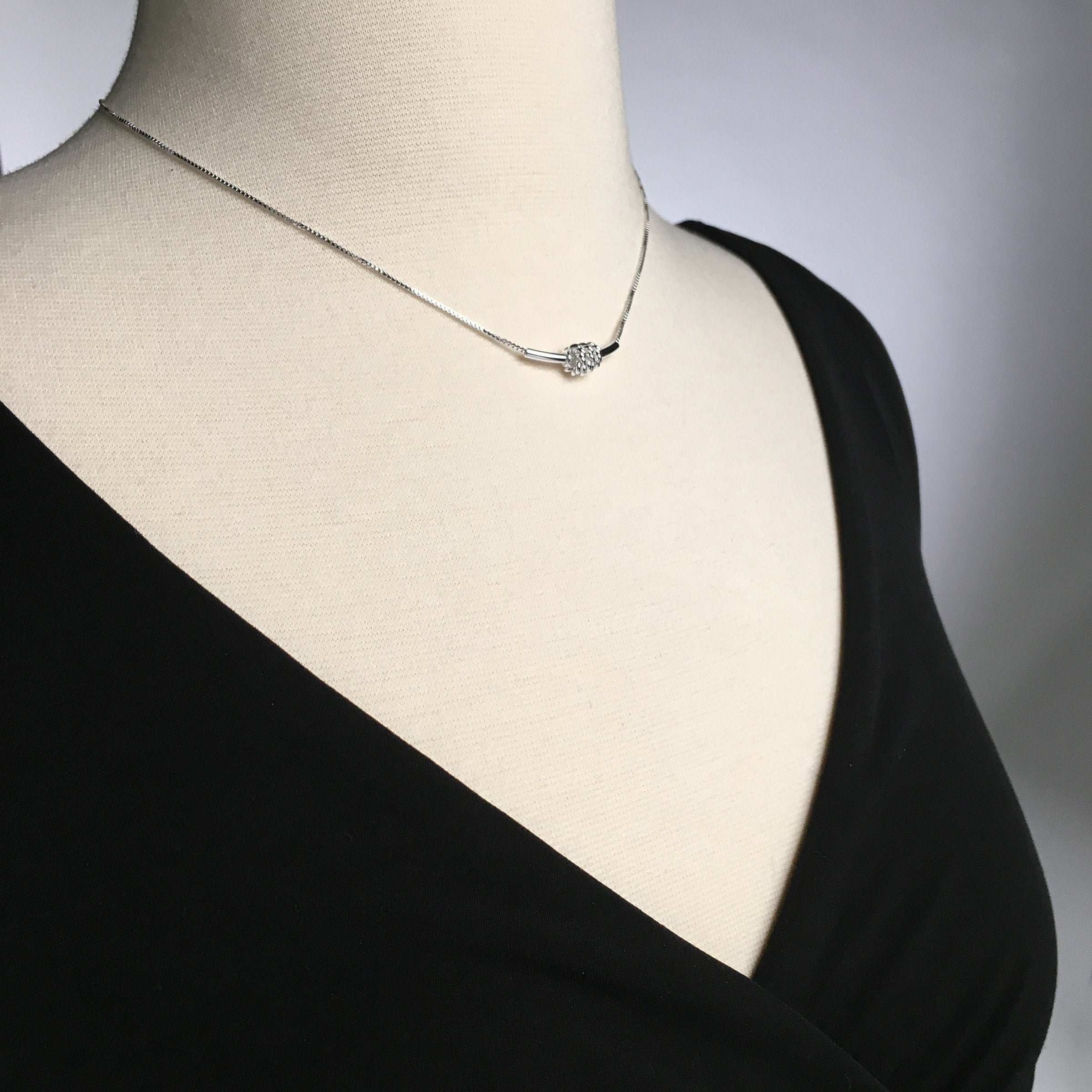 Tube Bar Necklace with Spinning Rings