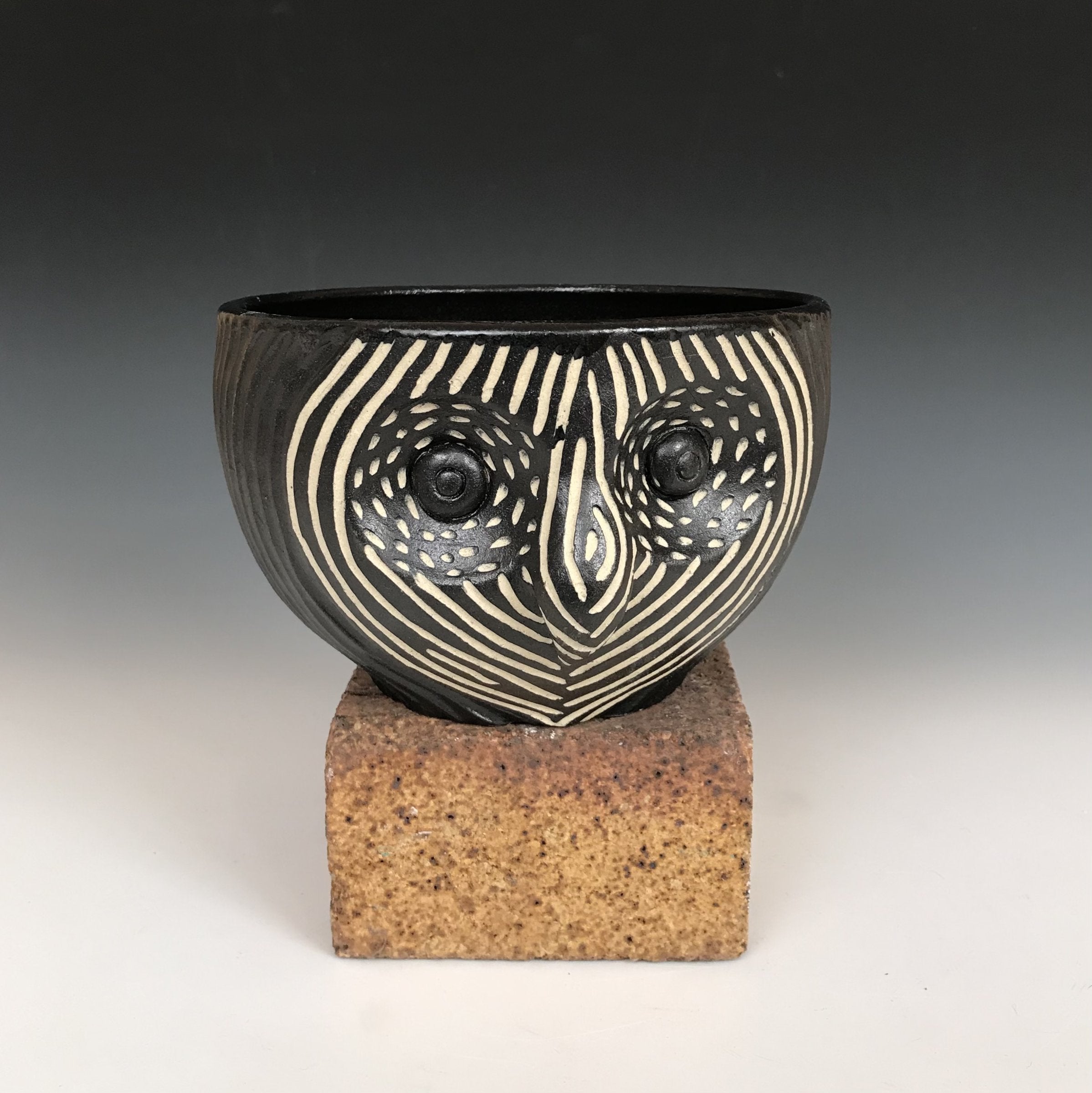 Round Faced Owl