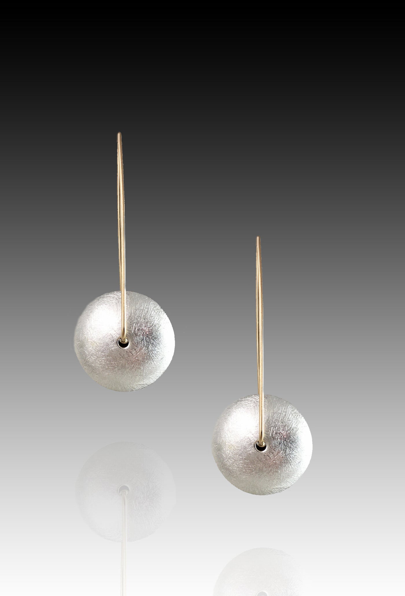 silver with gold ear wire