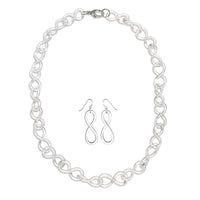 shown with the figure eight chain earrings