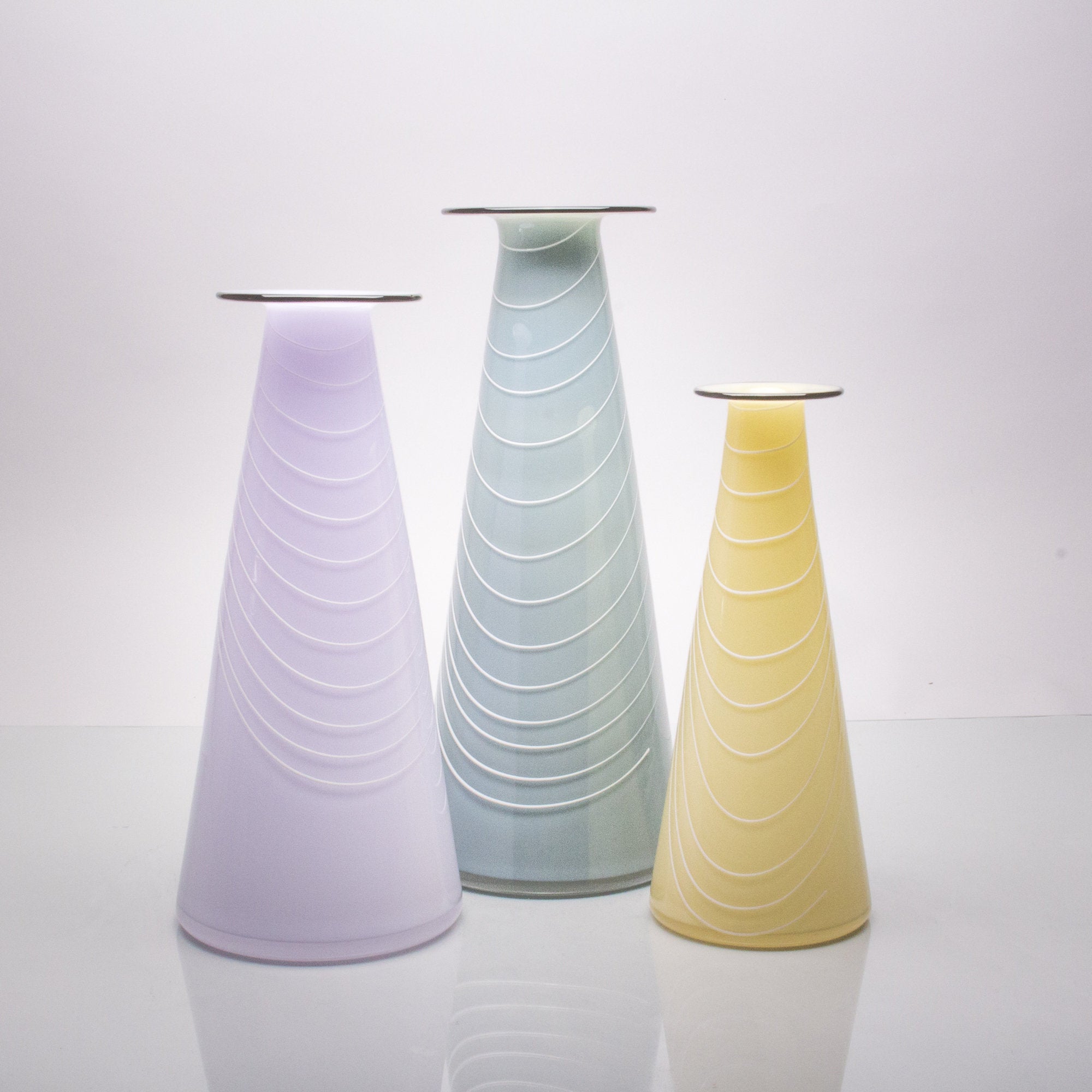 from left: medium pastel violet, large pigeon gray, small almond