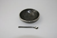 shown with a stainless steel bowl by nicole and harry hansen