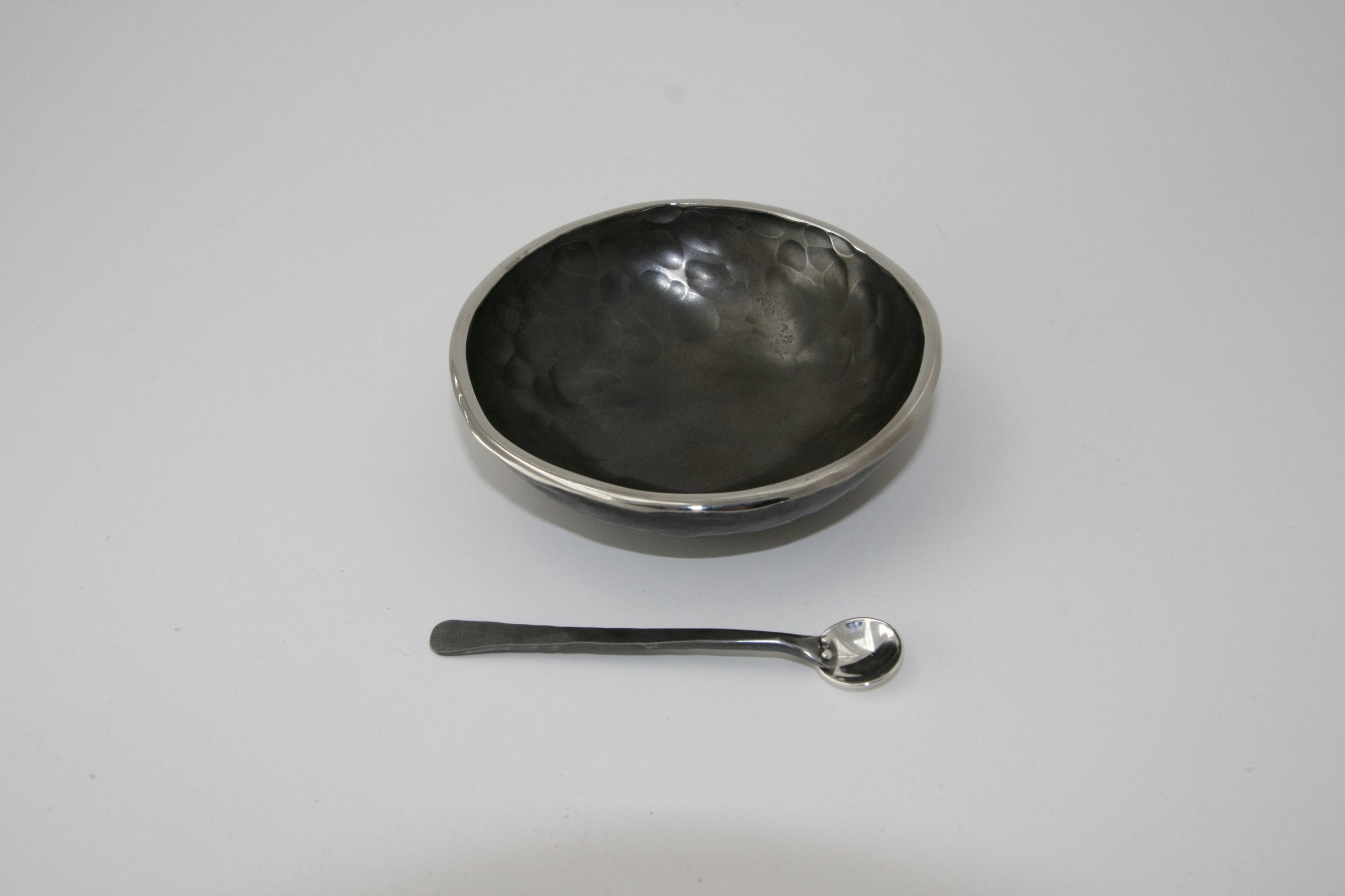 shown with a stainless steel bowl by nicole and harry hansen