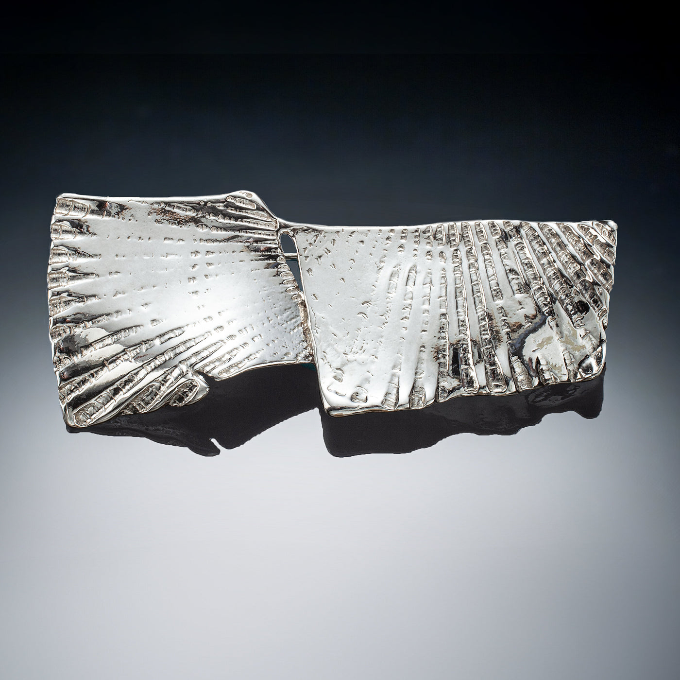 Shell-Design Pin | Photo by Ralph Gabriner