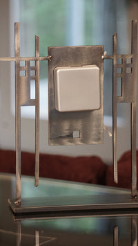 back showing silver clock movement cover