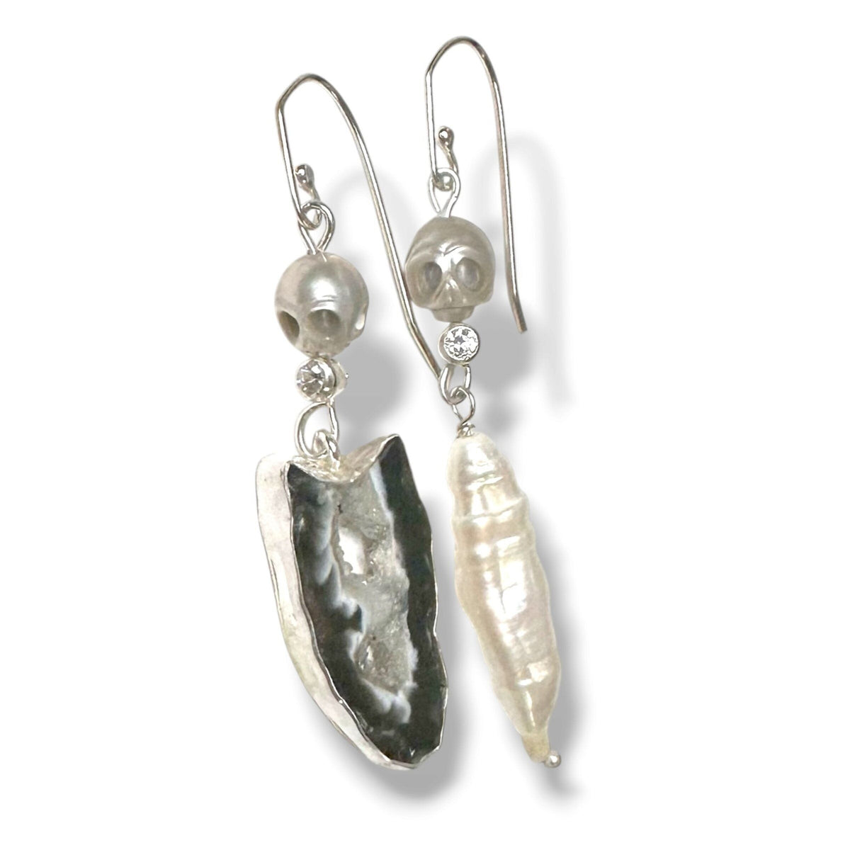 Carved Skulls Asymmetrical Earrings