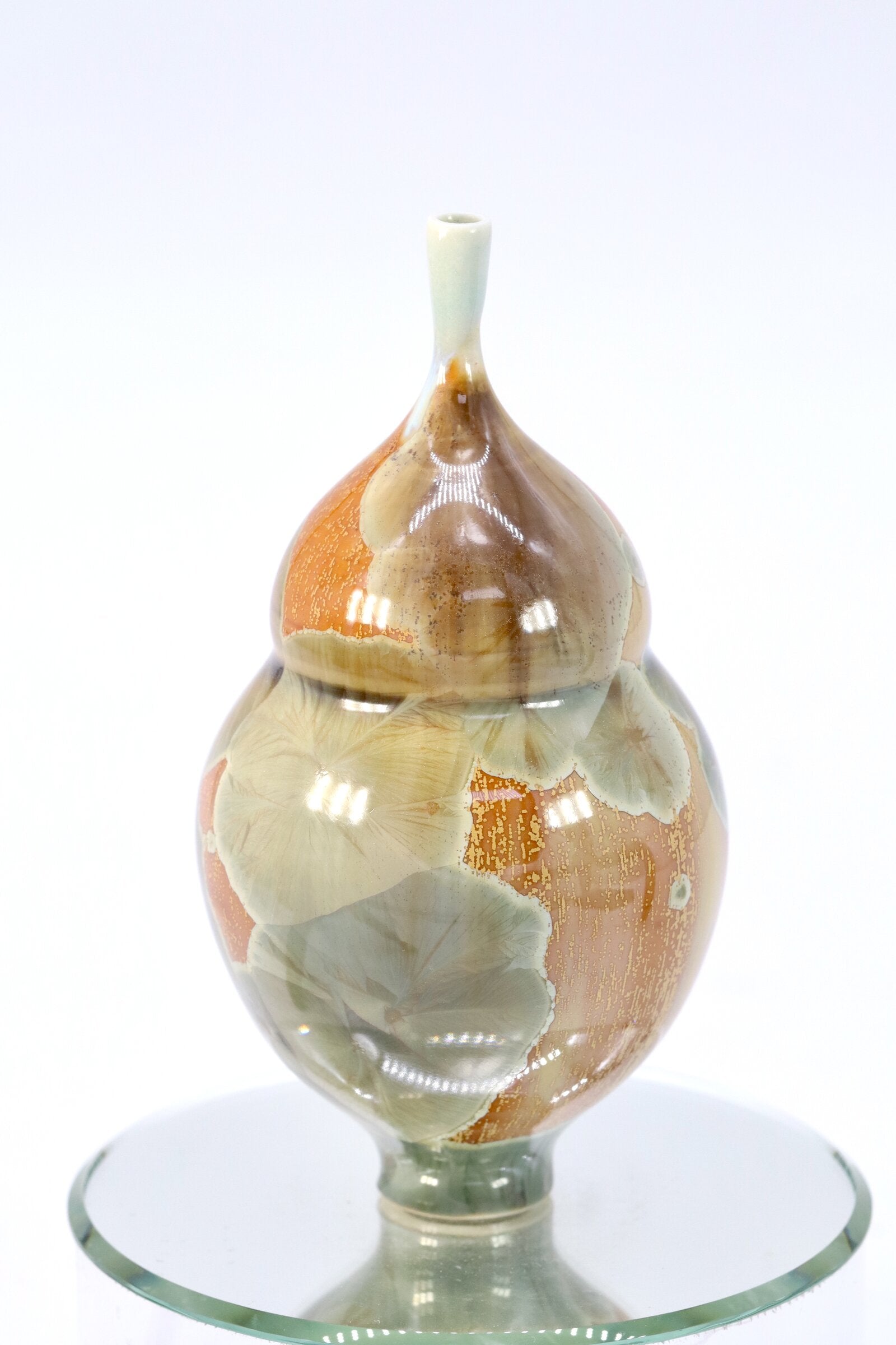 Miniature Crystalline Orange and Green Bottle