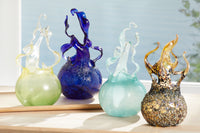 left to right: lemon lime raindrop, crystal cobalt raindrop, aqua raindrop, granite fireball