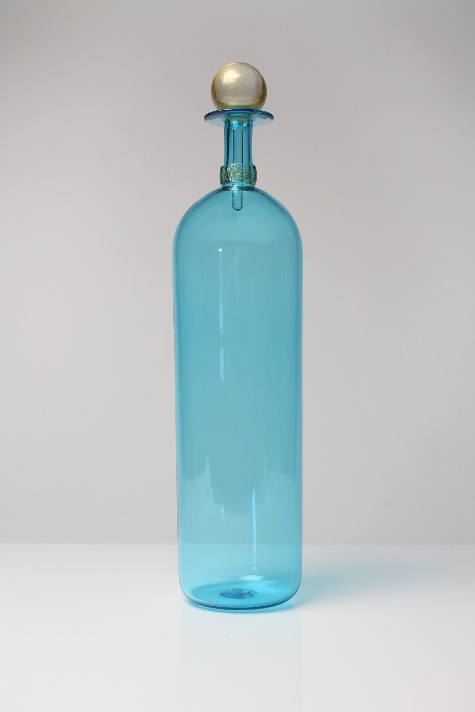 tall copper blue bottle