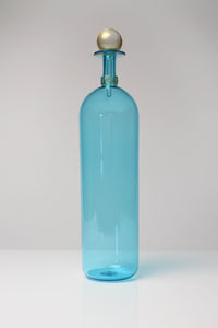 tall copper blue bottle