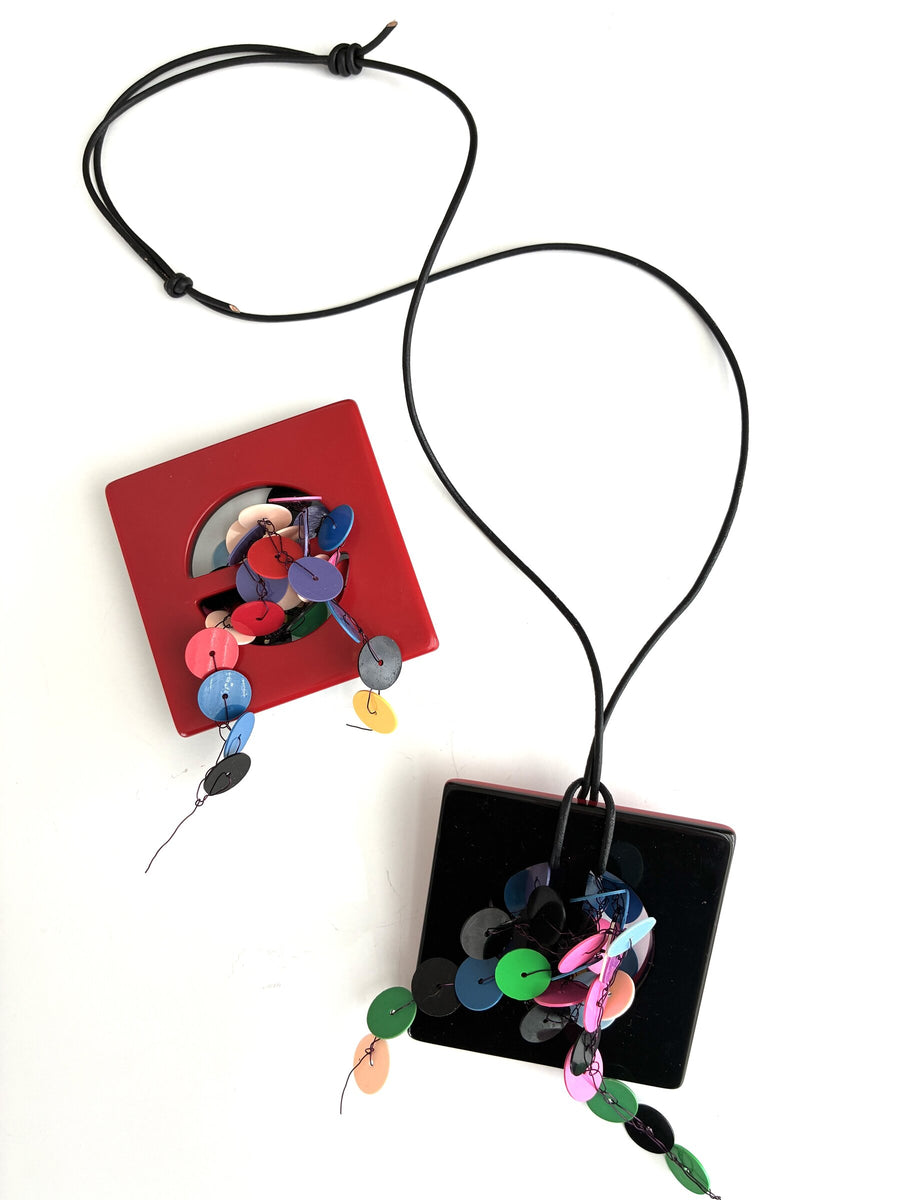 Showing both sides of the pendant