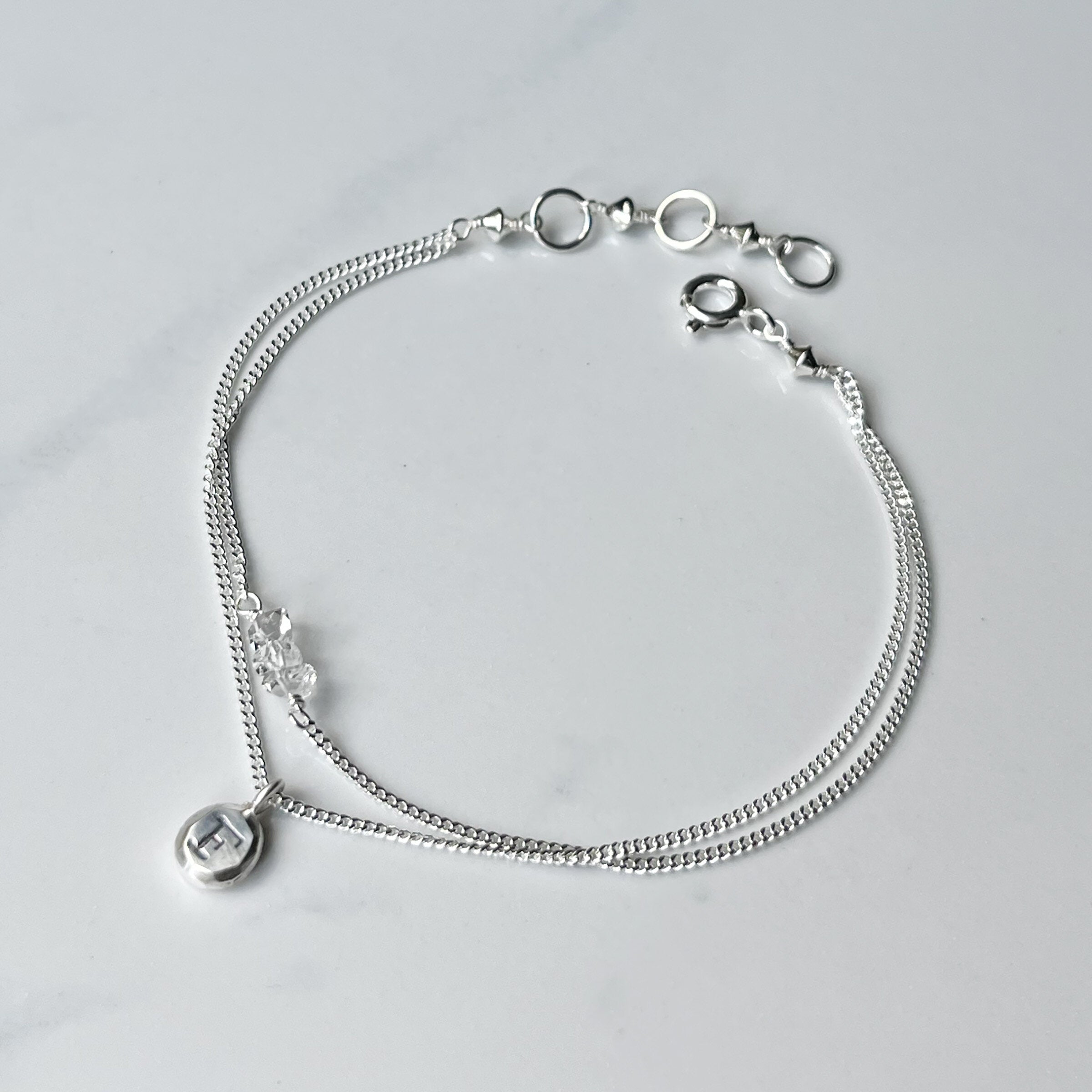 Echo Initial Bracelet