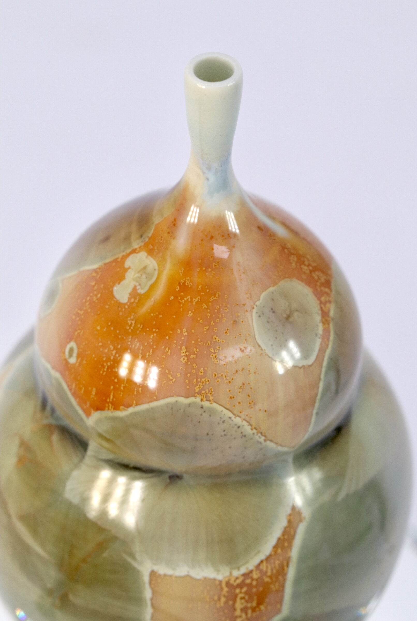 Miniature Crystalline Orange and Green Bottle