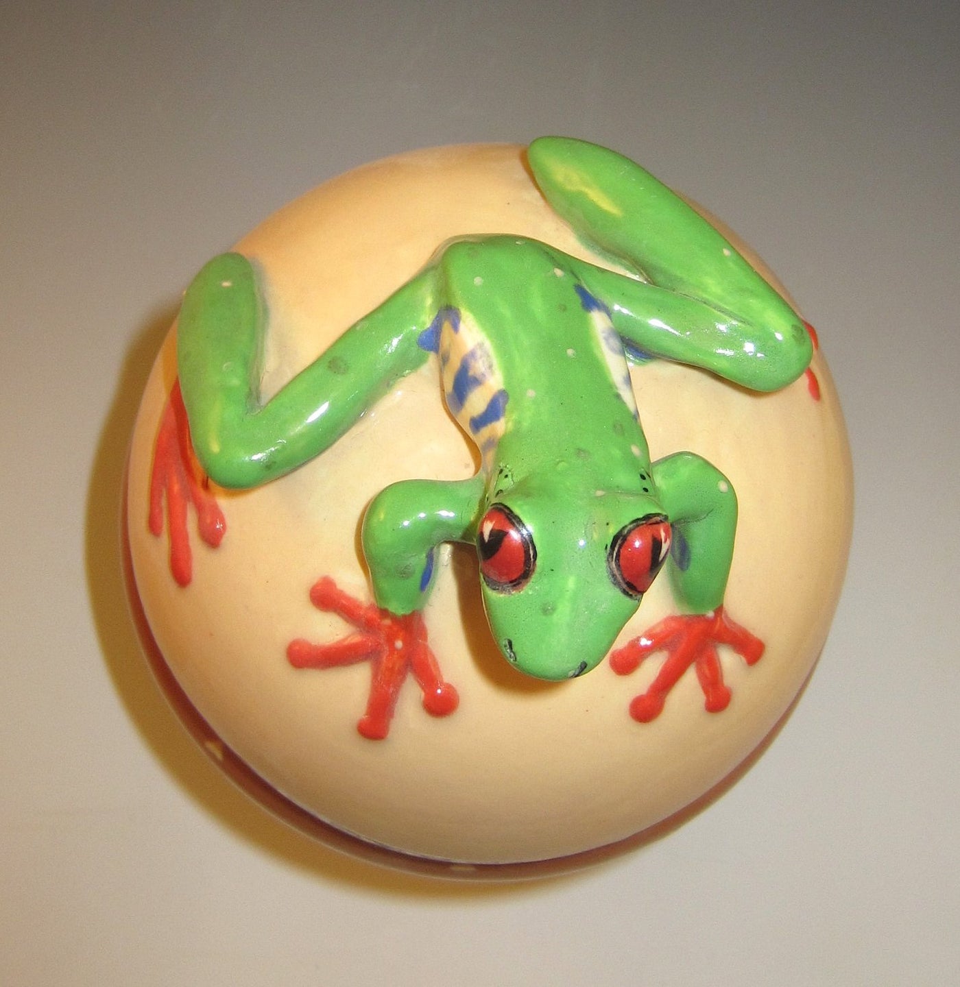 Red Eyed Tree Frog Lidded Jar on Striped Legs