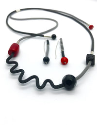 shown with the shapes and shadows earrings