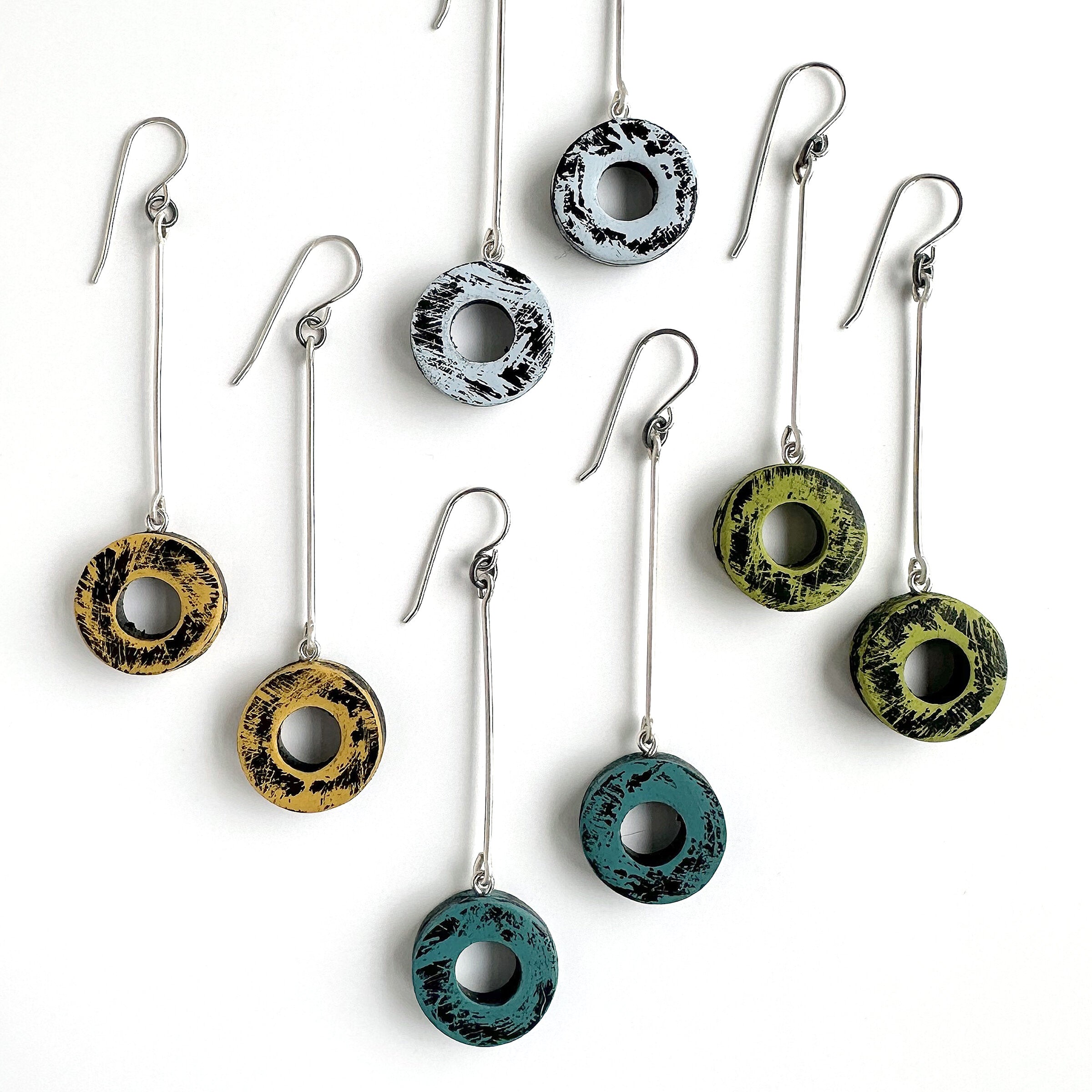 Clockwise: Black & White, Pear, Teal, Gold