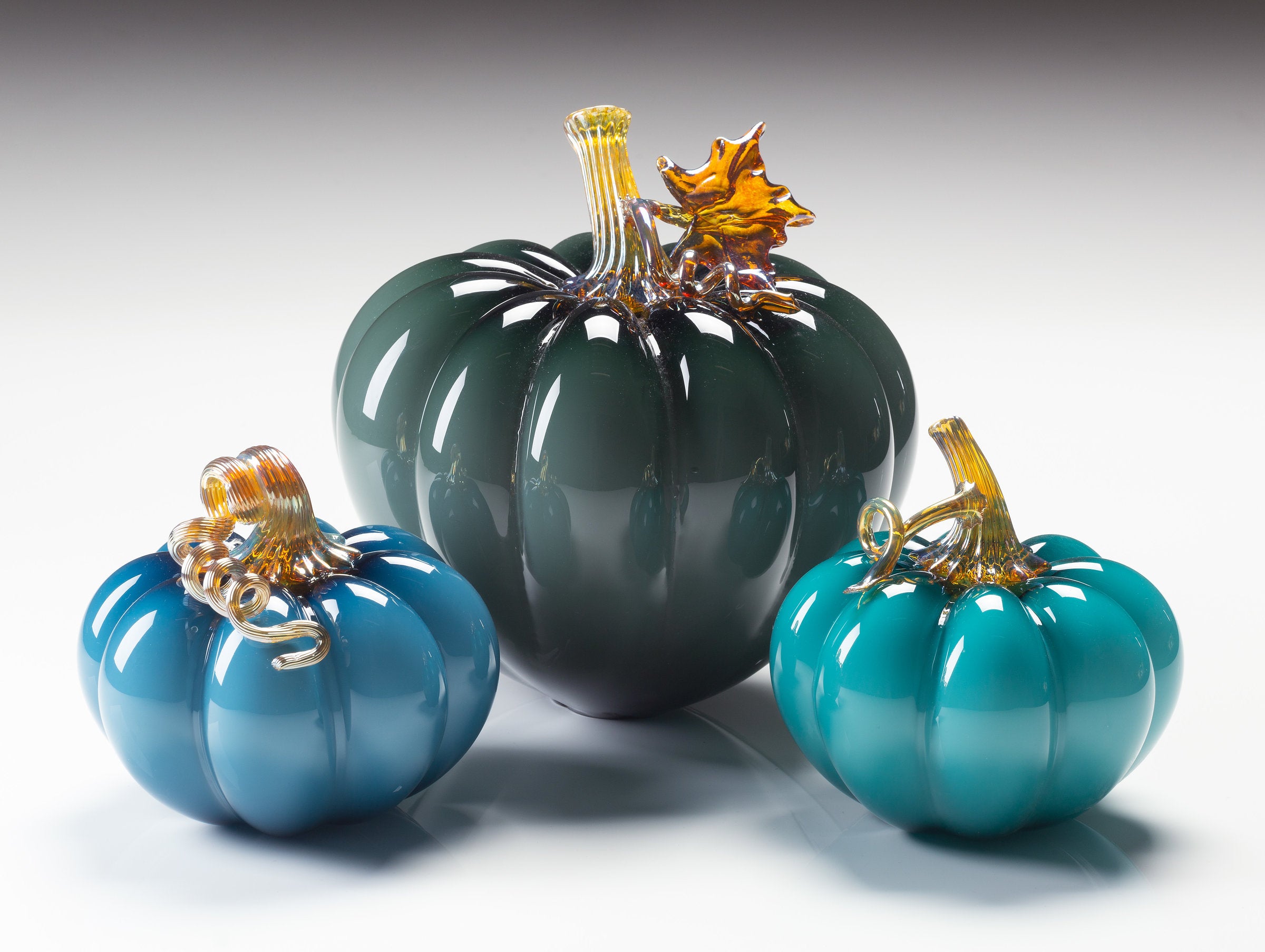 left to right: steel blue, smoky blue, lagoon