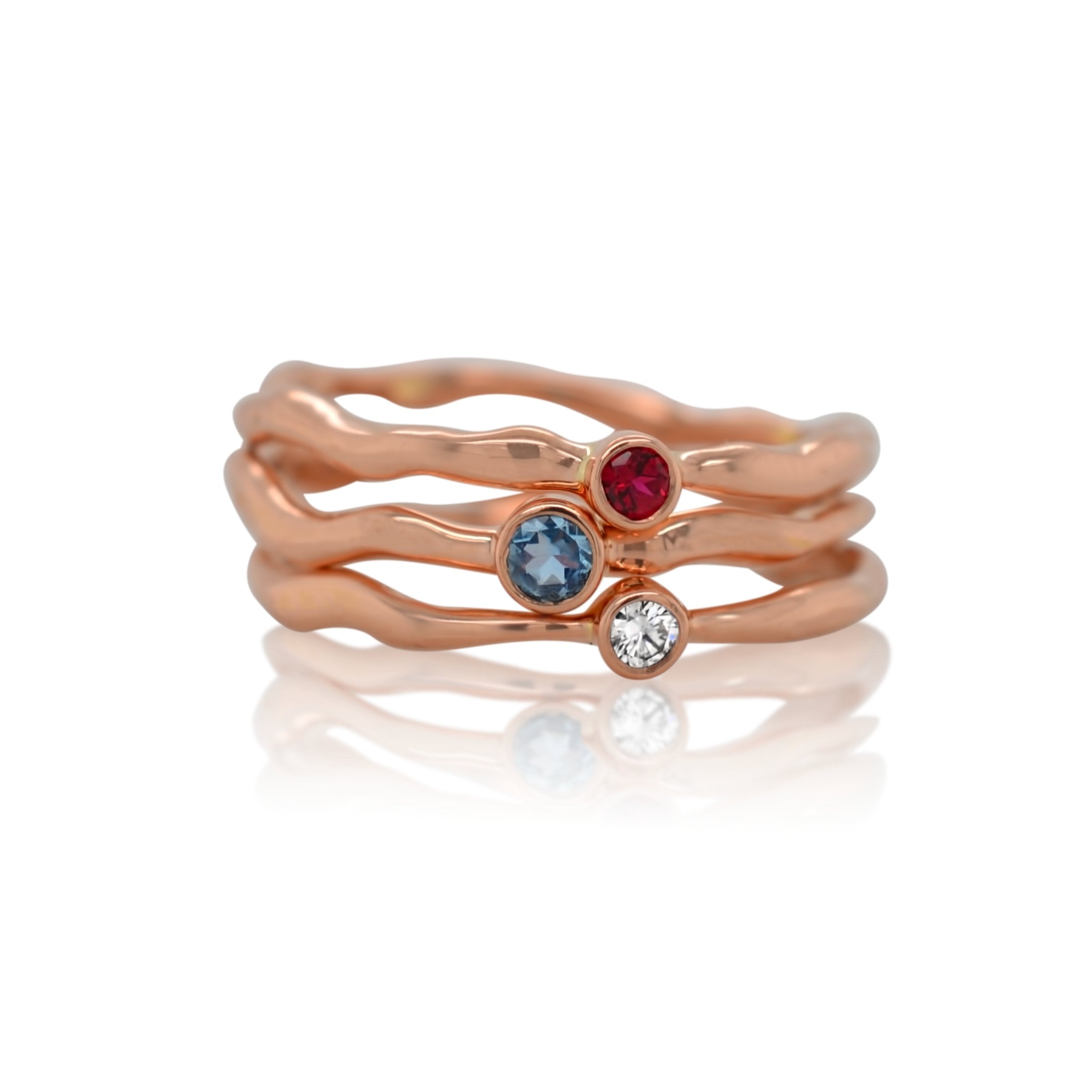 From Top to Bottom: Lab-grown Ruby, Aquamarine, Lab-grown Diamond