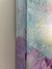 Shows part of signature on left horizontal side.