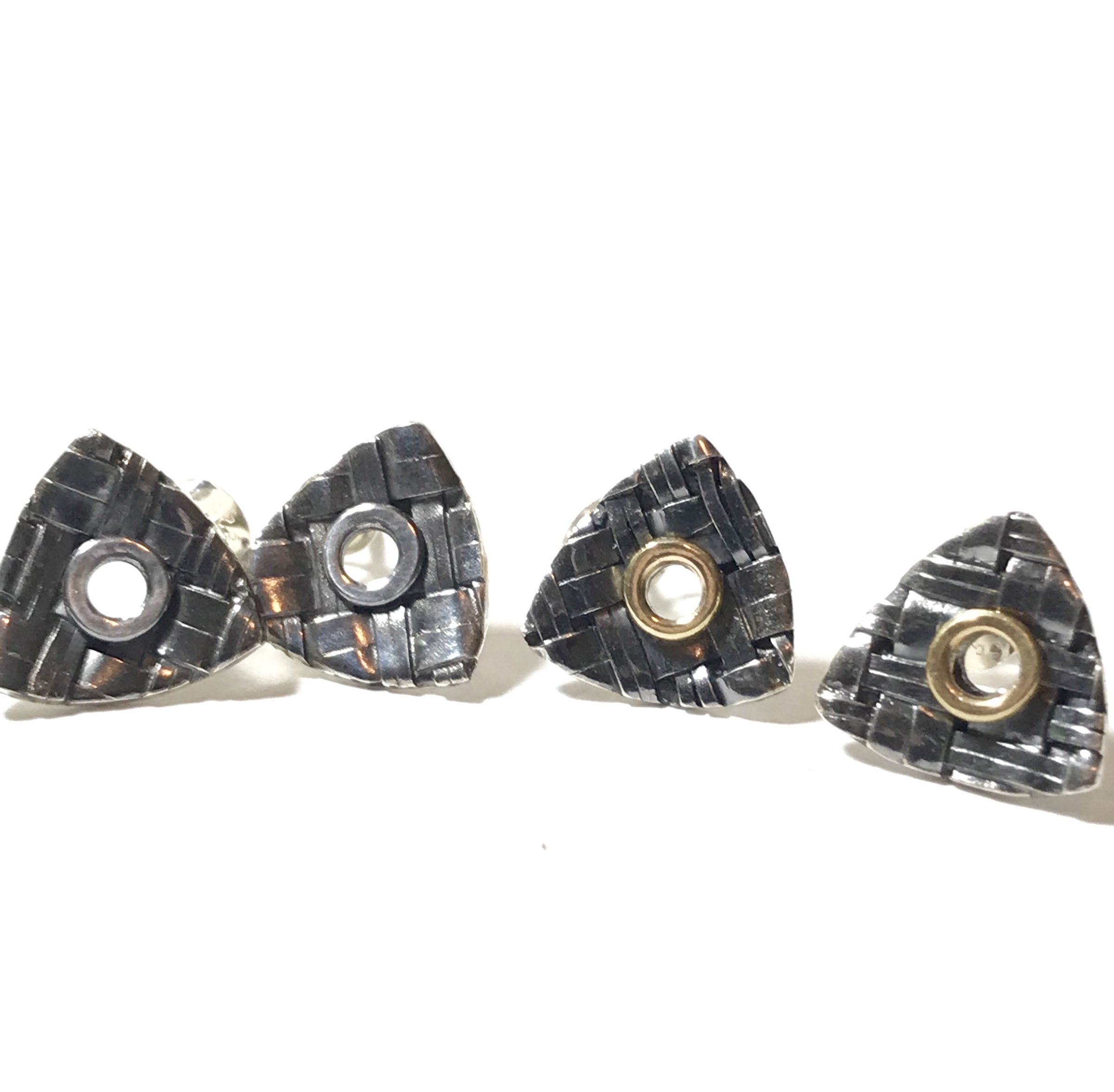 left: silver center, right: 18K gold center