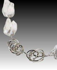Doves Always Travel In Circles Necklace