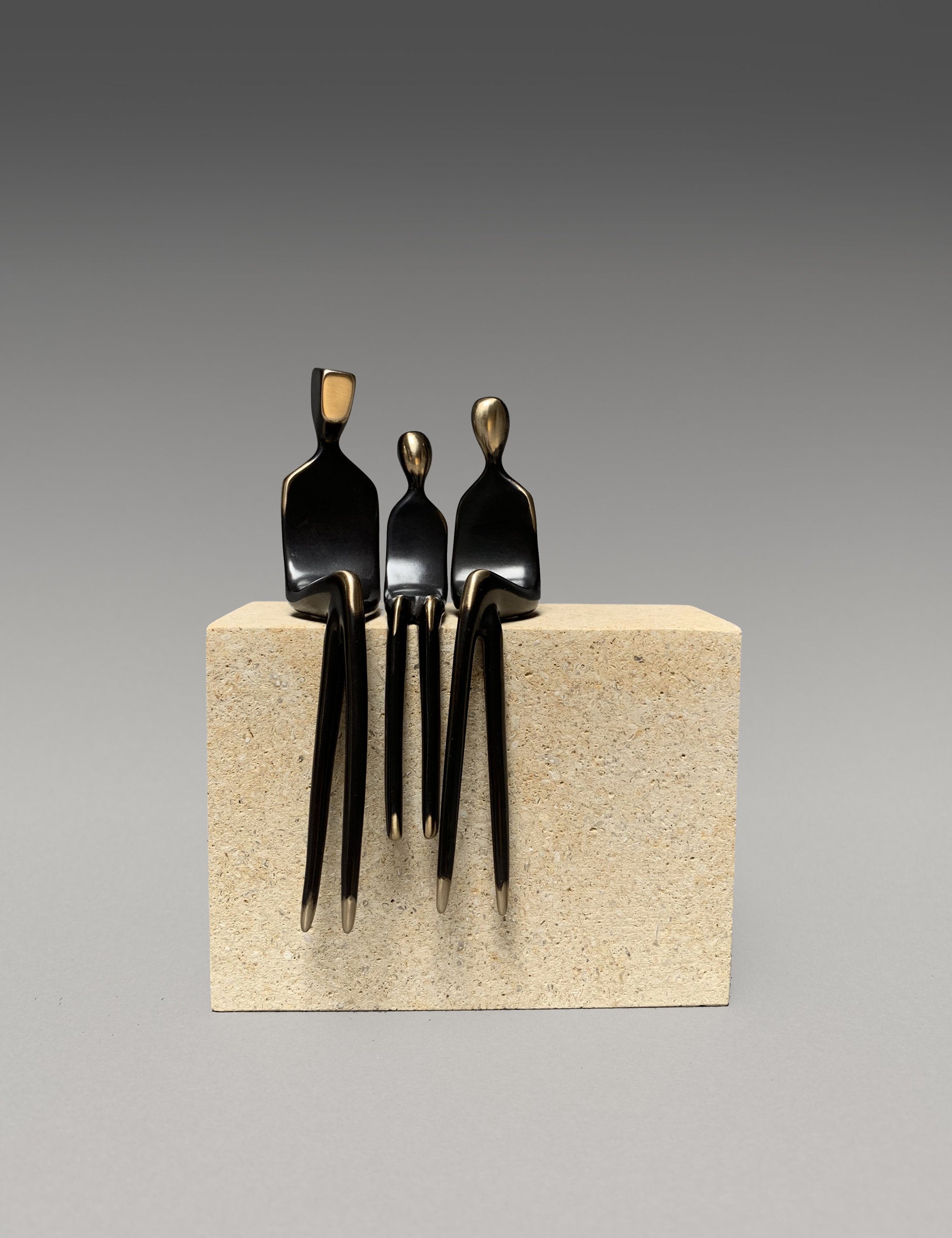 family with daughter with stone base