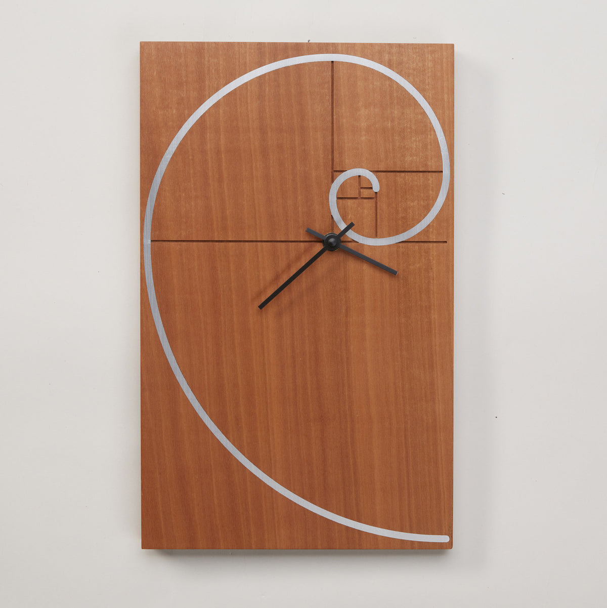 Fibonacci Spiral Clock in makore | Photo by Steve Smith Photography