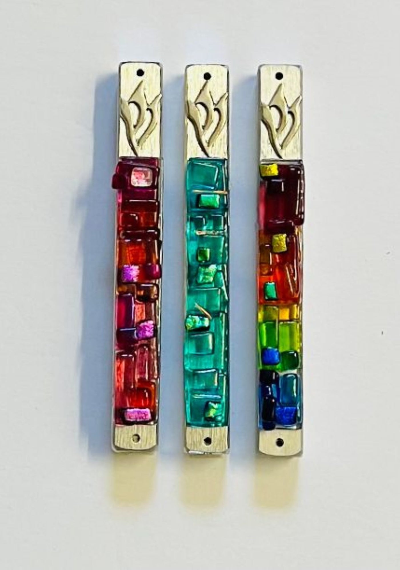 from left to right: Sunrise, aqua, multicolor