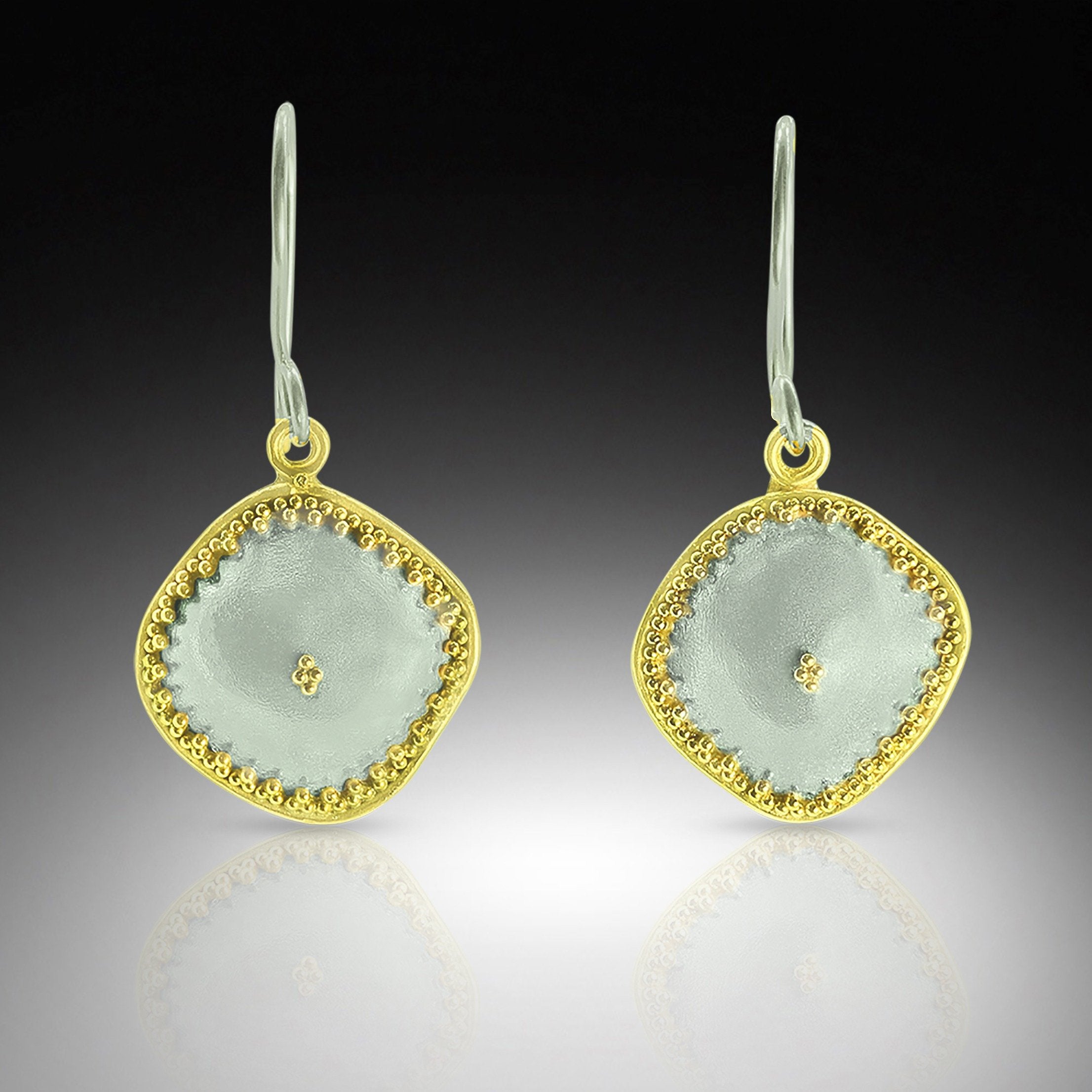 Brushed silver with sterling silver ear wire
