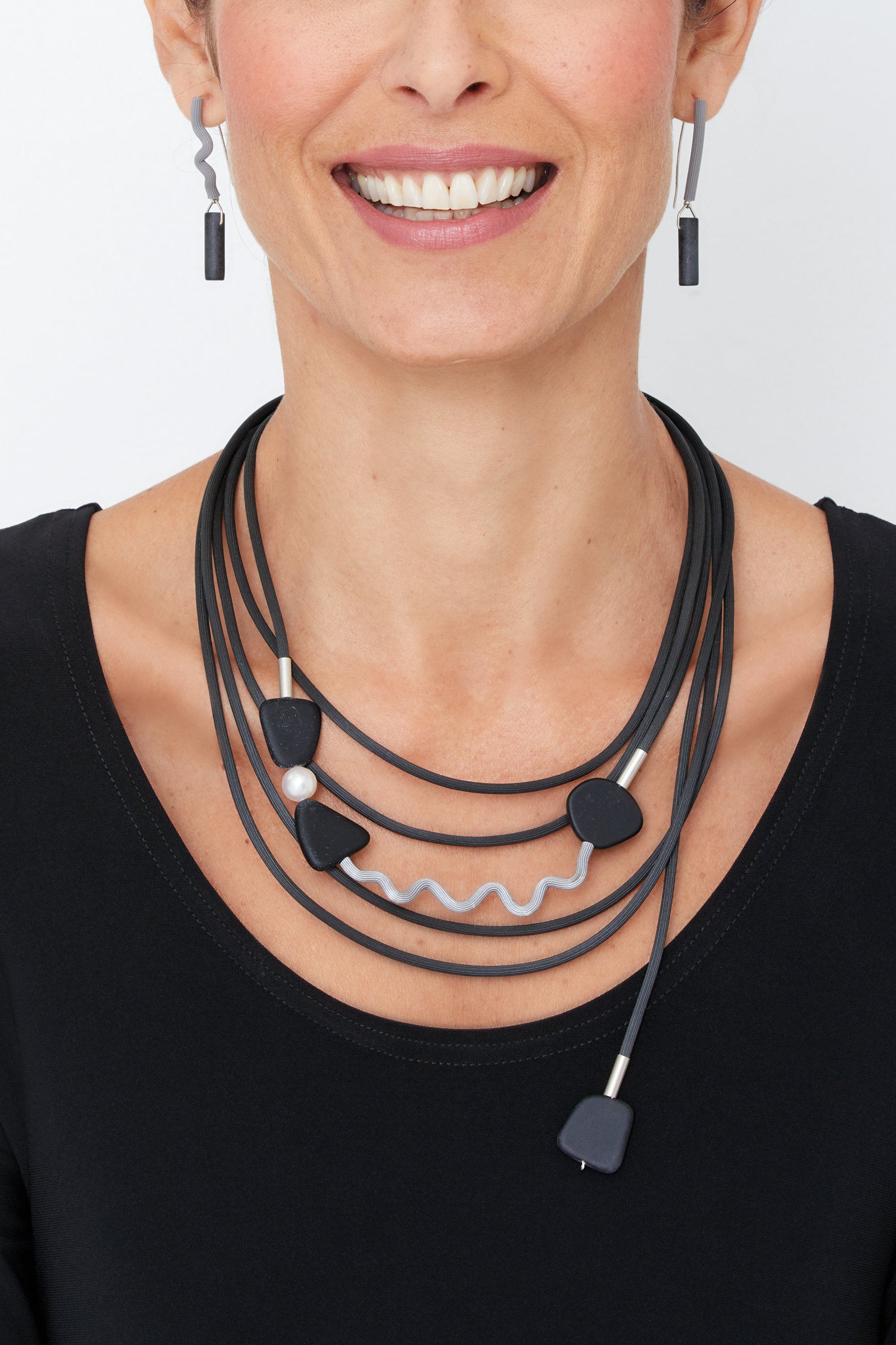 shown with the misty black necklace
