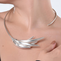 Sweeping Crescent Asymmetrical Neck Collar