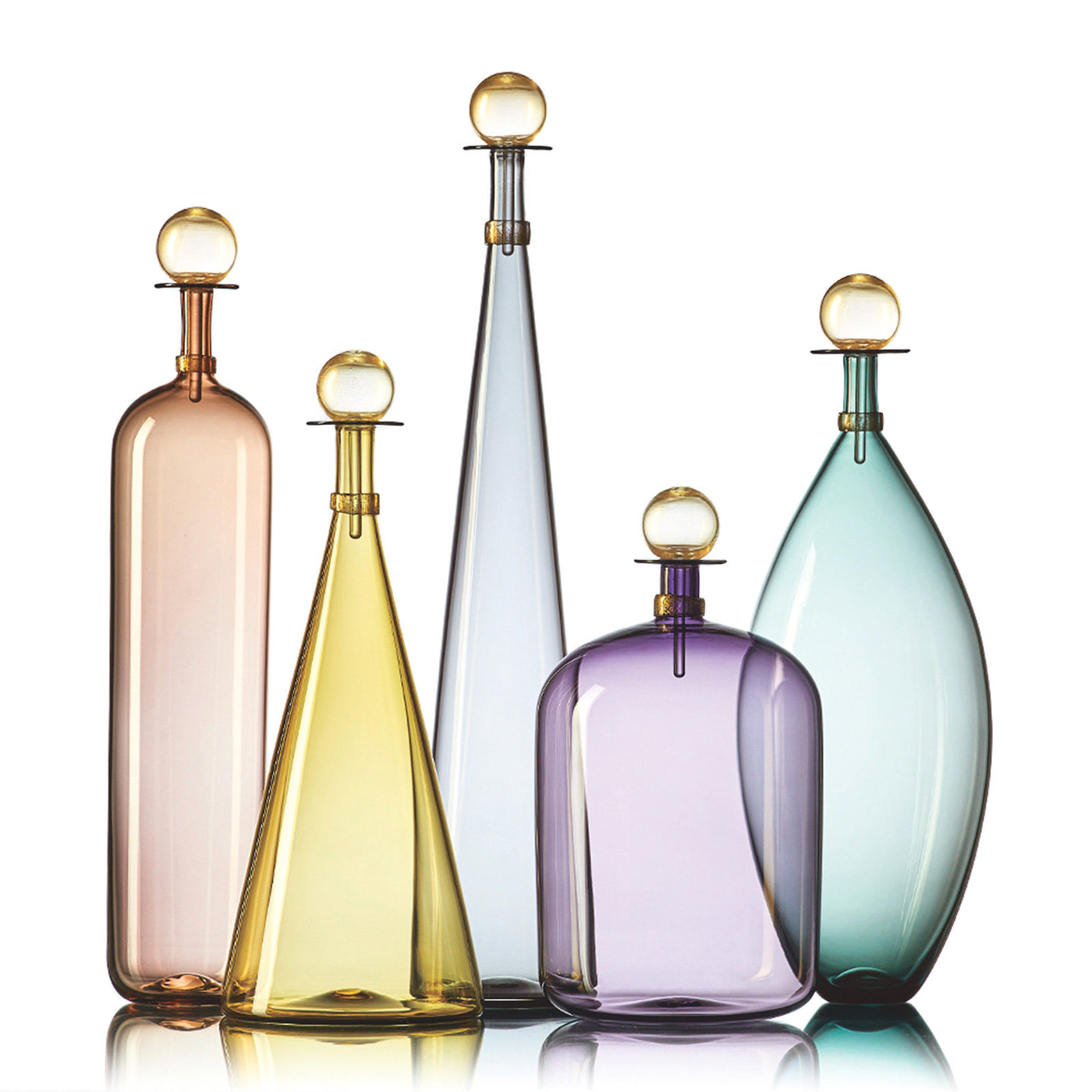 left to right: tall tea bottle, medium straw cone, tall gray cone, indigo jug, tourmaline ellipse