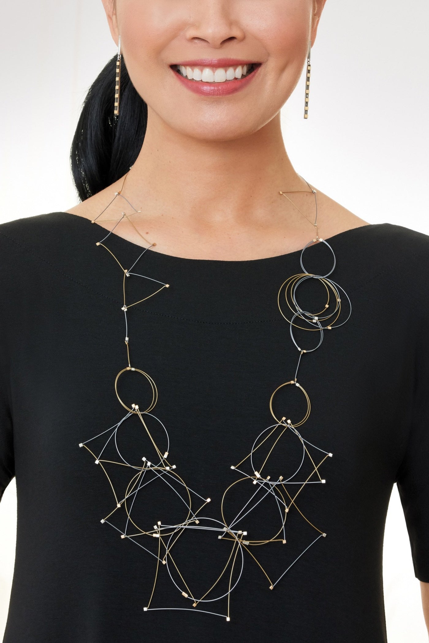 shown with the Long Shape Necklace by Meghan Patrice Riley