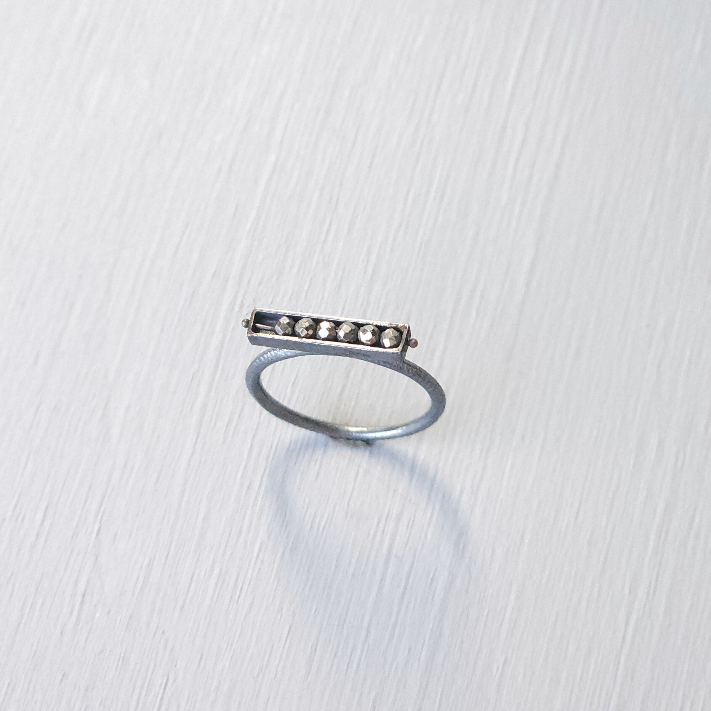 Horizontal Six Stone Segment Stacking Ring