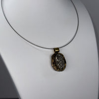Golden Cabochon Pendant