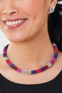 vibrant red, shown with the galaxy post earrings by melissa stiles